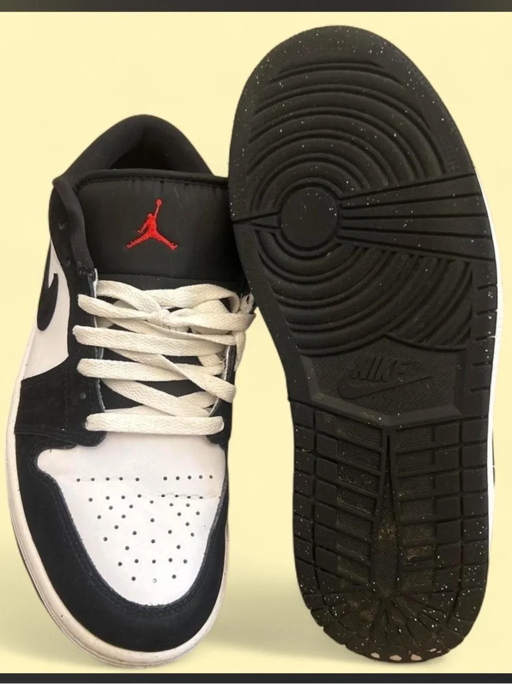 Nike Air Jordan 1 Low Black Metallic sneakers with black, white, red